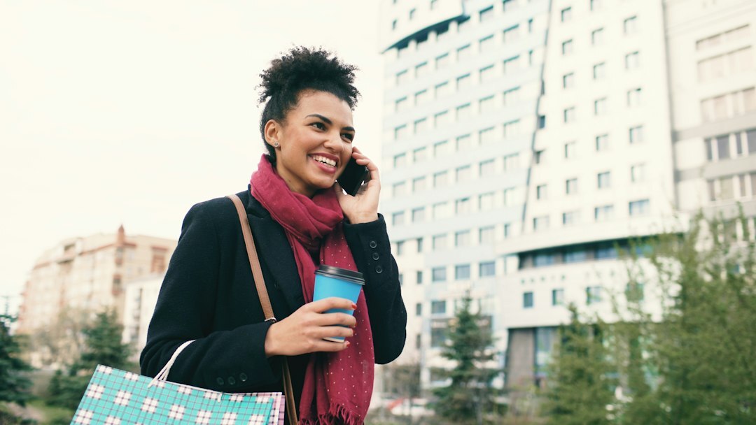 woman with red scarf on street