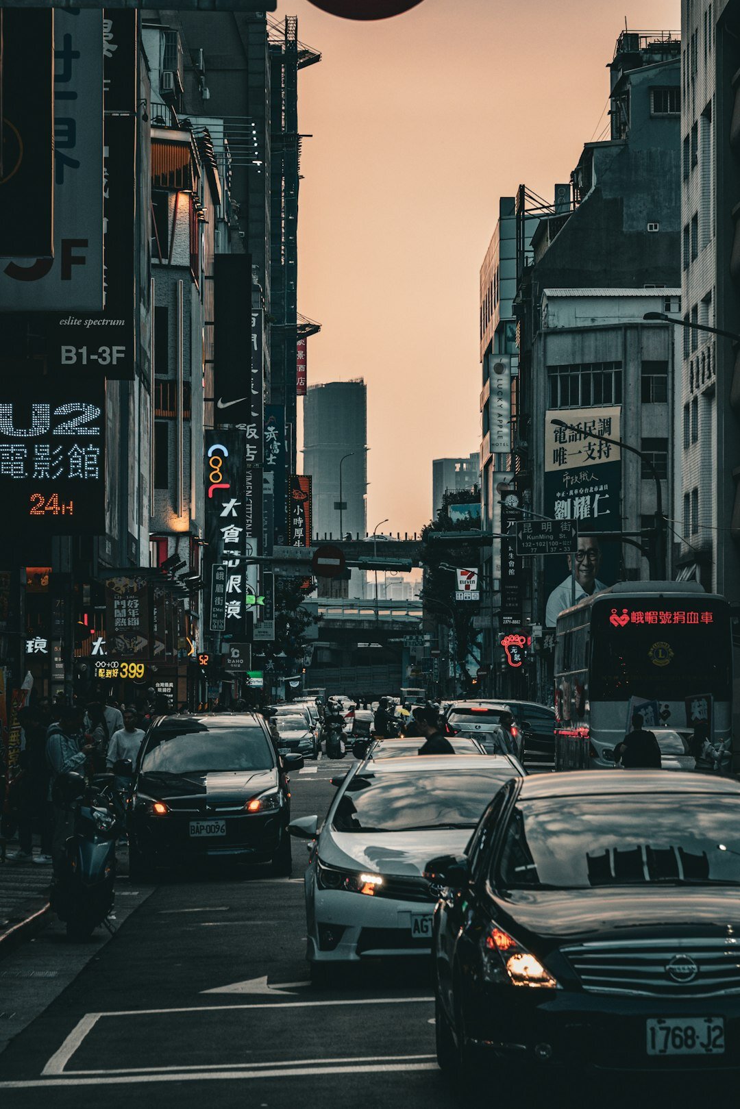 busy city street at dusk