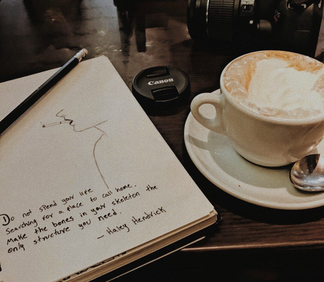 writer notebook in cafe